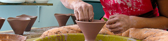 Resident artist working with clay in her studio