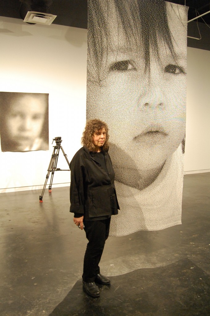 Artist Lia Cook in front of her piece "Big Tera" at Houston Center for Contemporary Craft